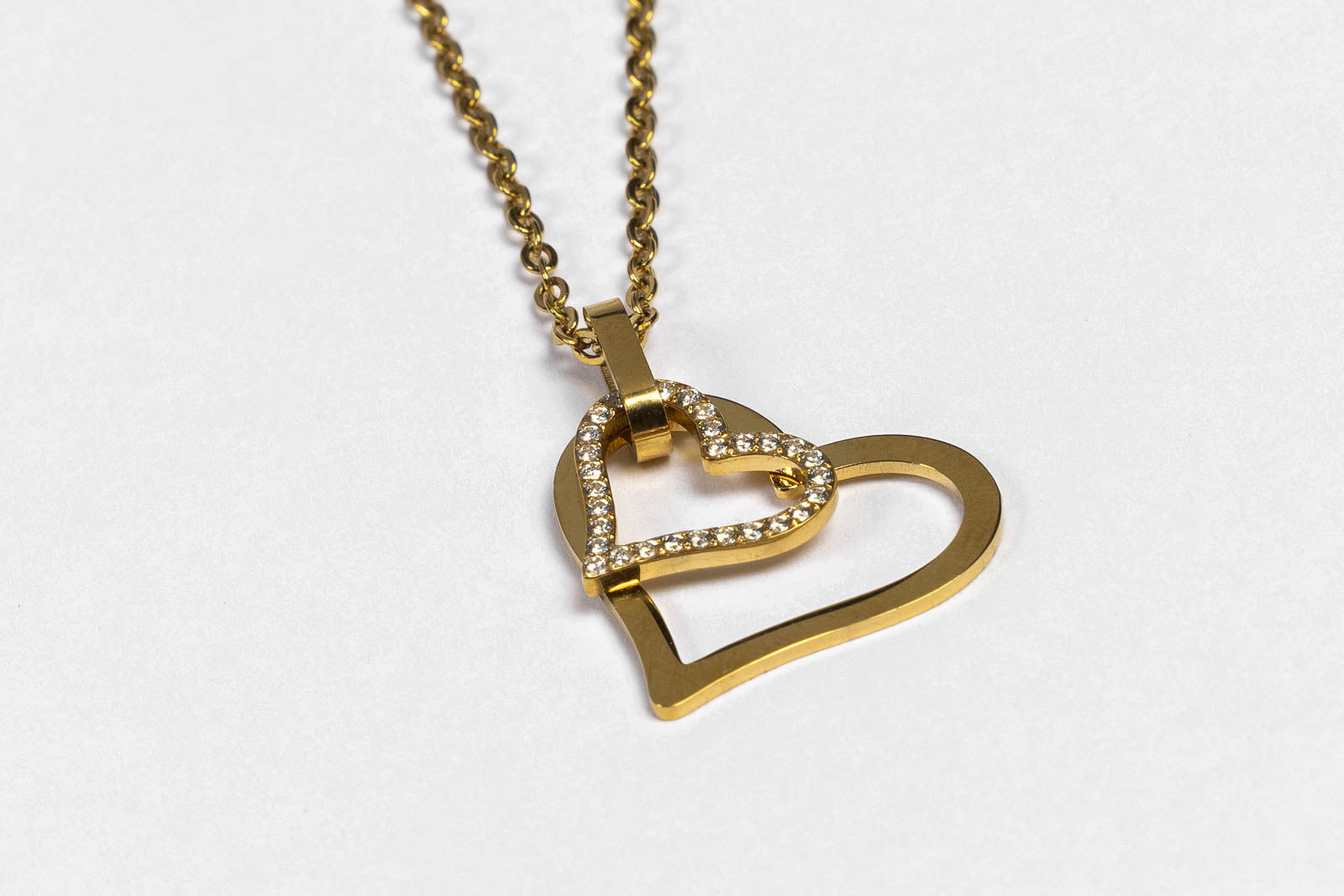 Collana due cuori intrecciati  con zirconi