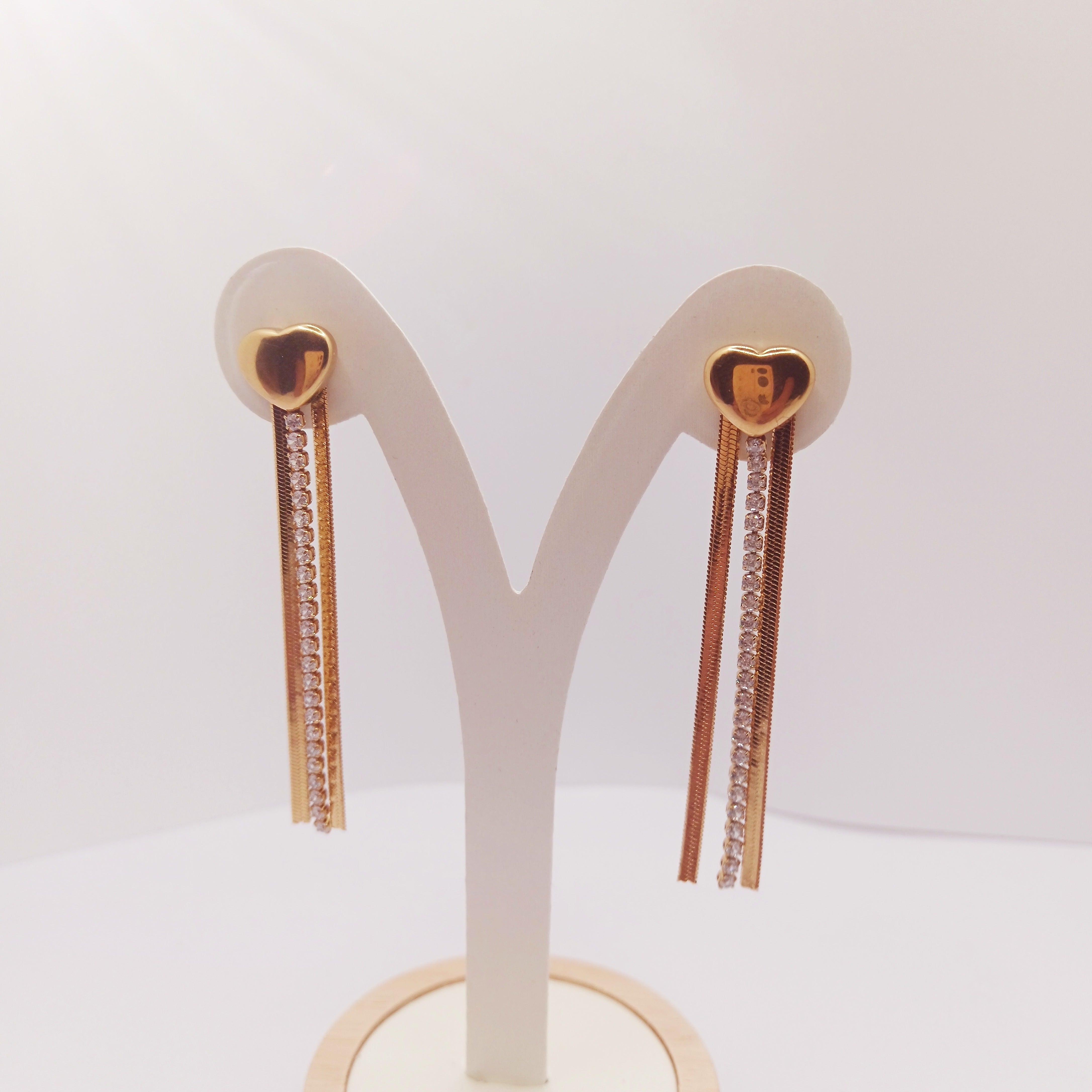 Orecchini Snake Dorati con Catena Tennis